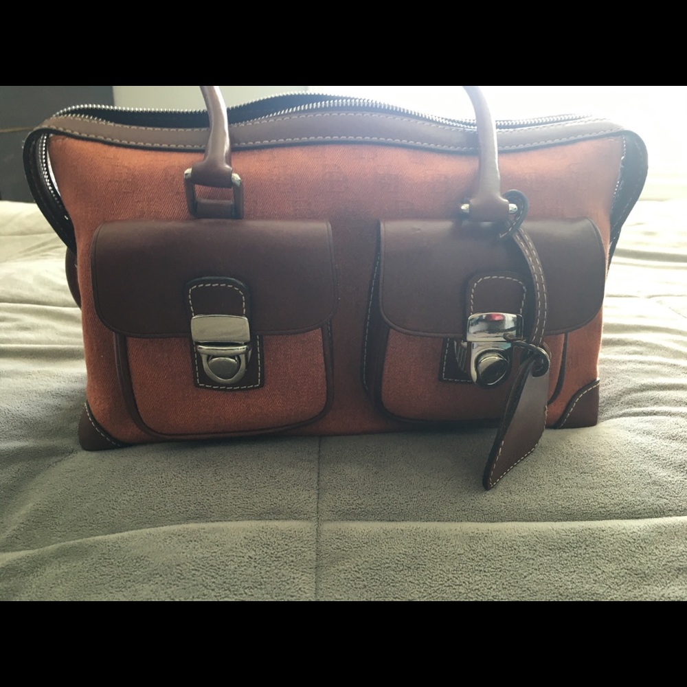 Rooney and Bourke purse